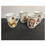 4 Norman Rockwell cups one has chip