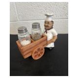 Chef with cart and salt & pepper shakers