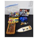 Group of Lego parts pieces and model kits