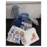 Kitchen towels, four plastic bowls, plastic