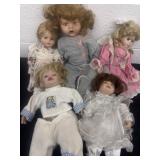 5 porcelain dolls