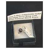 Size 9, but adjustable solid sterling silver ring