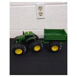 8.5 x 6 x 5 inch plastic John Deere tractor with