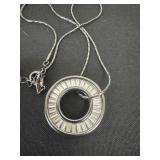 necklace featuring a circular pendant