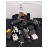 Large group of cameras and camera equipment