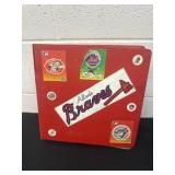 Red binder of baseball cards