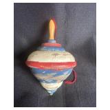 vintage wooden toy is a spinning top 4ï¿½