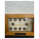 Shadow box presentation of Indian head pennies