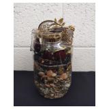 6.5 in plastic jar full of costume jewelry