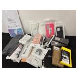 Group of new phone cases and tempered glass