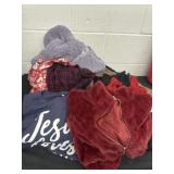 Group of clothes all different sizes.