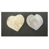 2 carved stone hearts