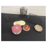 Group of coasters, candle, metal holder and