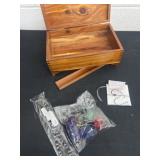 Wood jewelry box, broken leg, misc jewlrey  and
