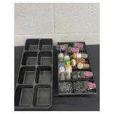 Trays of tacks and nails with empty tray