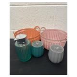 Group of plastic baskets and bathroom container