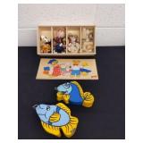 Two heavy vintage fish and a Goli box with