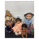 3 dolls with scarecrow