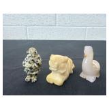 3 carved stones