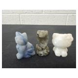 3 carved stones