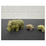 3 carved stones