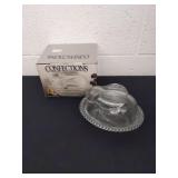 Confections by Indiana glass bunny on a nest 7 in