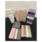 Group of firming cream, lip gloss and more.