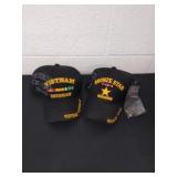 Two Vietnam veteran hats one is a Bronze Star