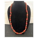 34ï¿½ necklace features vibrant red coral tube
