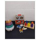 Two Melissa and Doug wooden puzzle toys and a