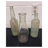 3 glass bottles