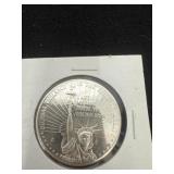 1 Troy ounce .999 fine silver round featuring the
