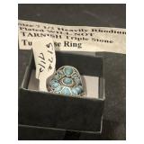 Size 7 1/2 heavily rhodium, plated triple stone,