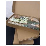 3 boxes of animal party supplies balloon bags