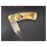 2.5ï¿½ eagle pocket knife  with long rifle tin