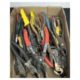 Group of pliers, snap rings, wire cutters