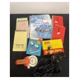 Group of note pads, bank pins and more