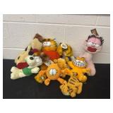 Group of garfeild stuffed animal