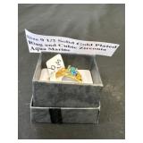 Size 9 1/2 solid gold plated ring, and cubic