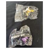 Two Air Jordan keychains