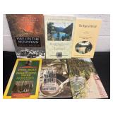 Group of mountain and gold books