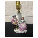 vintage Victorian-style porcelain figurine lamp