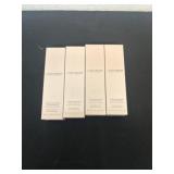 Four bottles of Laura Mercier tinted moisturizer