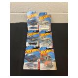 Six brand new hot wheels
