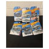 Six brand new hot wheels