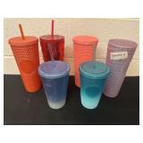 Group of star bucks cups