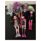 Group of Monster High dolls