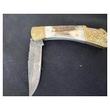 New 4ï¿½ engraved Demascus knife