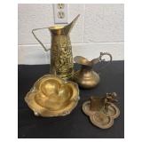 Group of brass items pitchers bowl and figurine