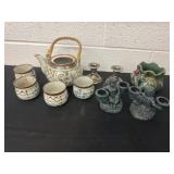 Tea pot and cups and candle holders